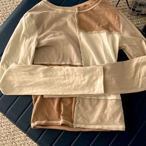 I am selling two shirts. They are long sleeve.